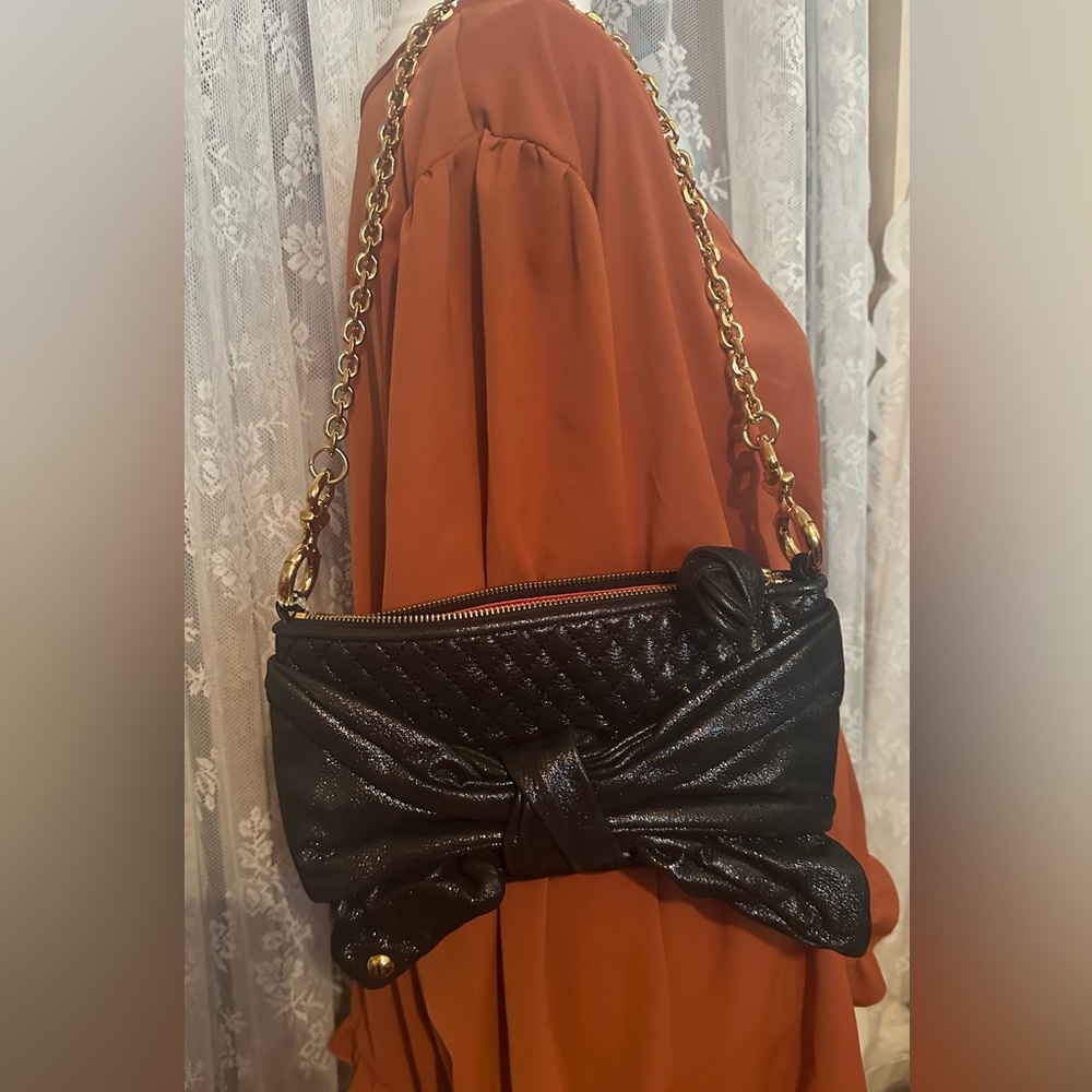 Vintage juicy couture. Black & gold hardware. Made of leather.